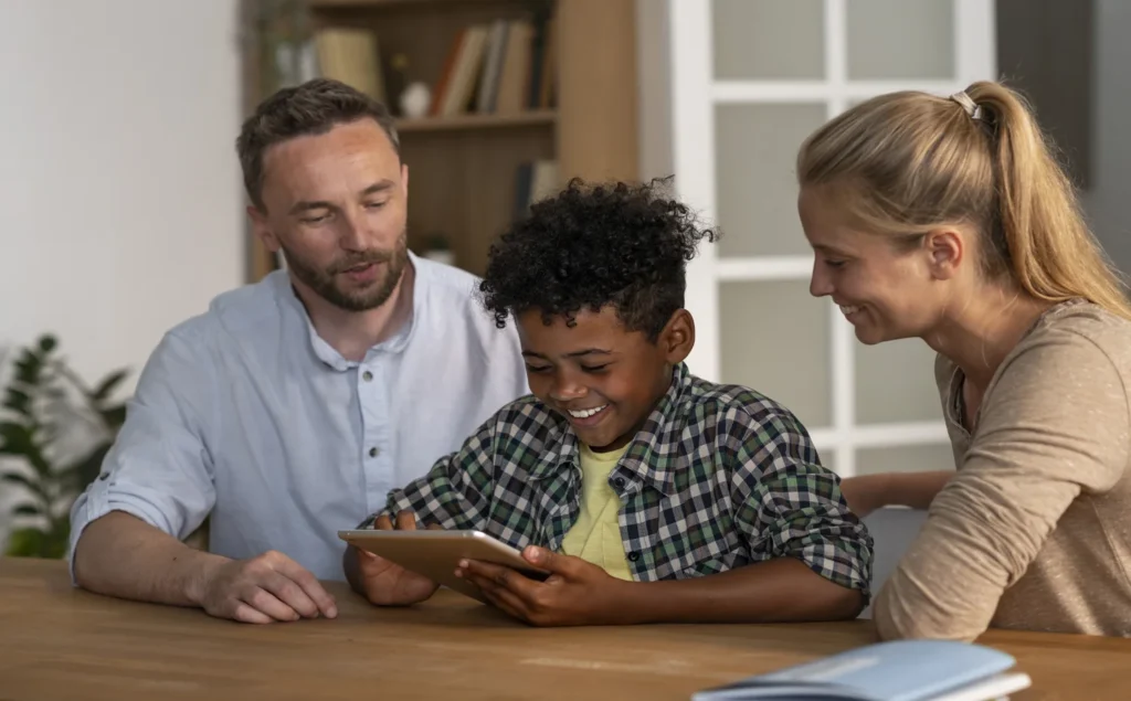Parent and child managing online safety together with trust.